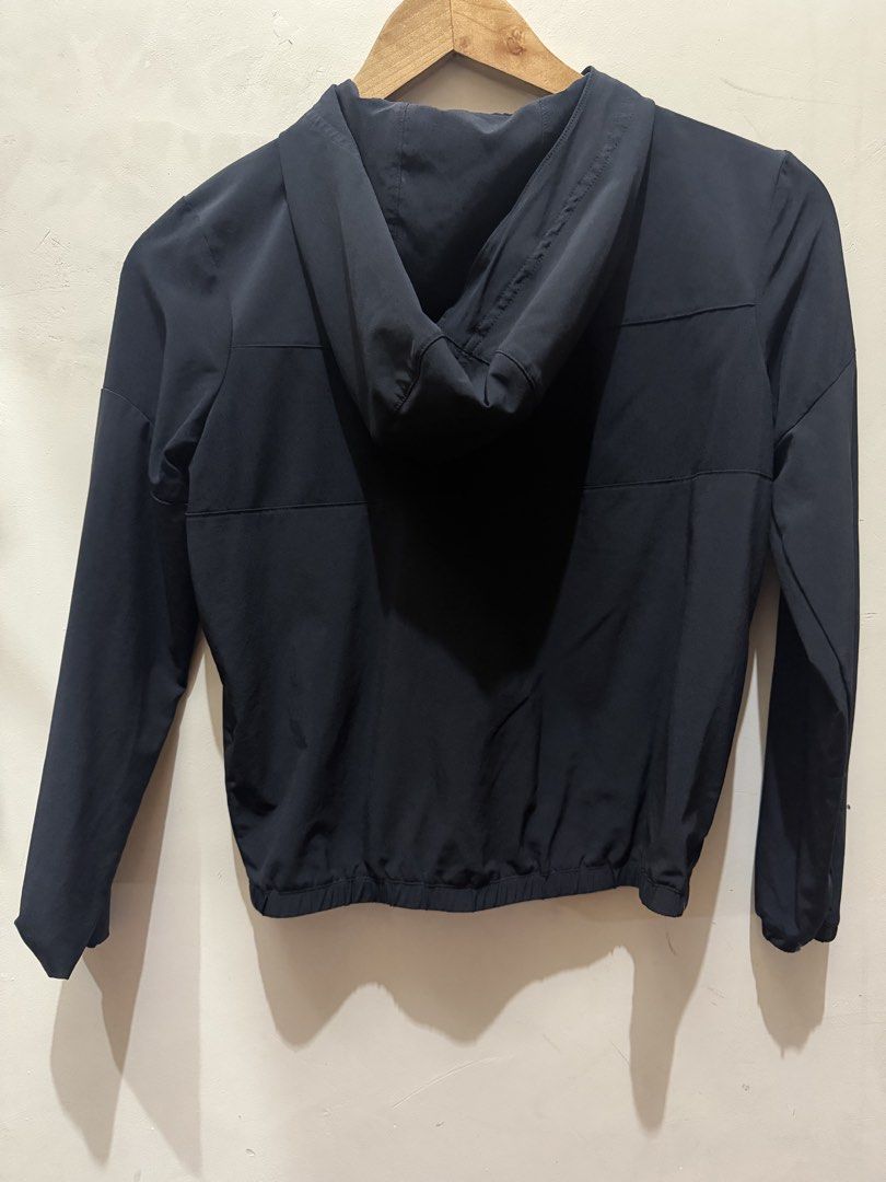 Decathlon Black Hooded Windbreaker Jacket (Category: Coats, Jackets and Outerwear) located in Las Pinas. Submitted by mjm21 (Listing ID 1463849644, Image 2). Description: - Brand: Decathlon - Type: Hooded Windbreaker Jacket - Color: Black - Size: 10-11 years - Closure: Full zip front - Pockets: Two zip pockets - Features: Elasticated cuffs and hem - Origin: Made in Bangladesh - Ideal for: Outdoor activities, everyday wear.