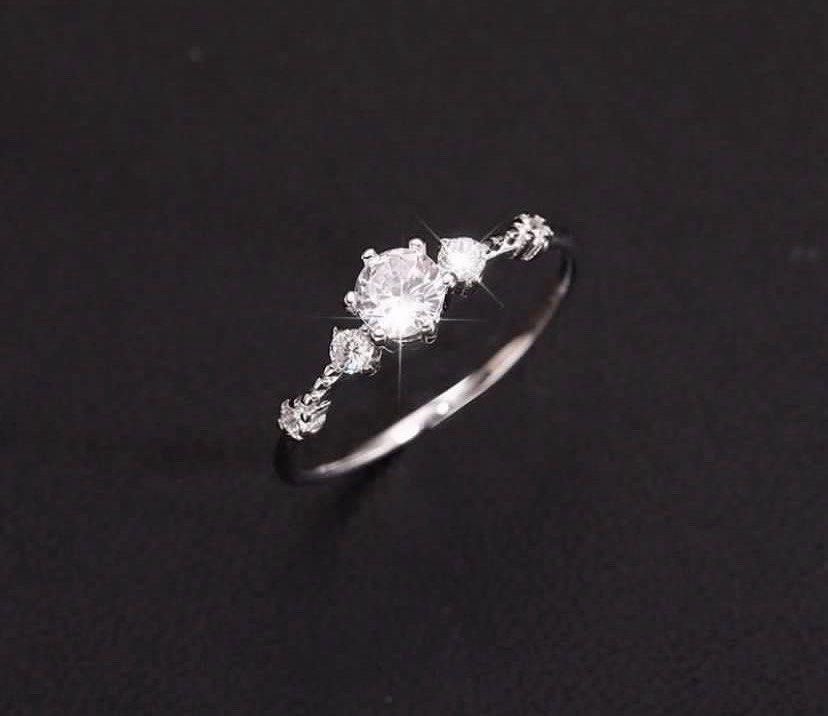 delicate silver adjustable diamond ring (Category: Rings) located in Singapore. Submitted by buysellcloset (Listing ID 1463886921, Image 2). Description: delicate silver adjustable diamond ring Brand new in plastic Free sized .