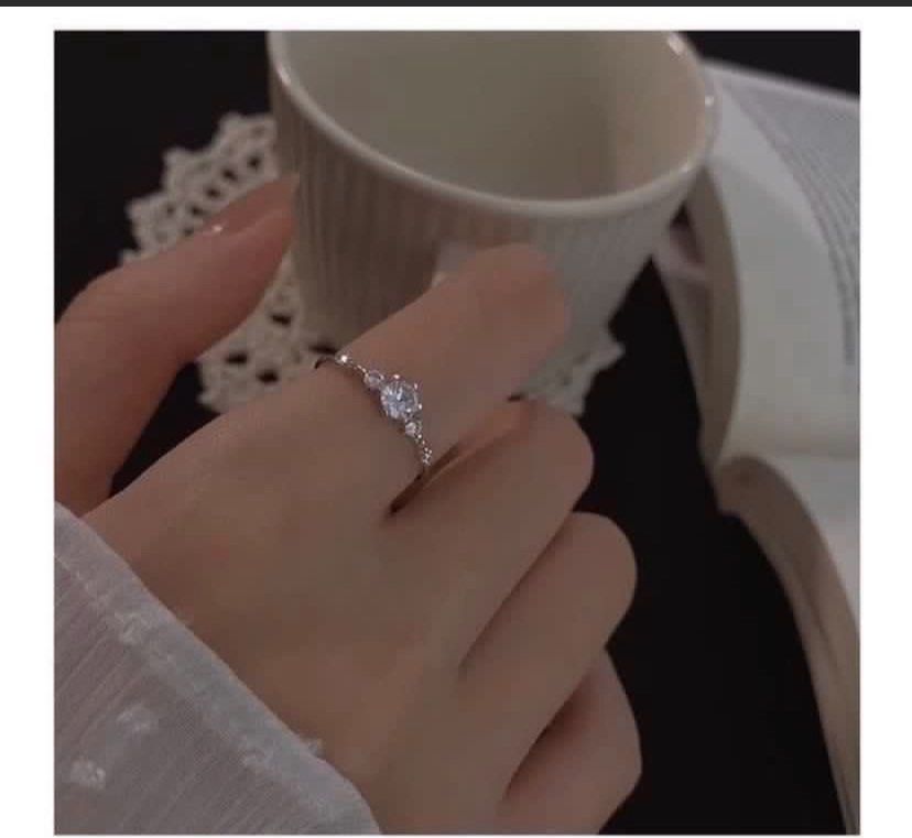 delicate silver adjustable diamond ring (Category: Rings) located in Singapore. Submitted by buysellcloset (Listing ID 1463886921, Image 4). Description: delicate silver adjustable diamond ring Brand new in plastic Free sized .
