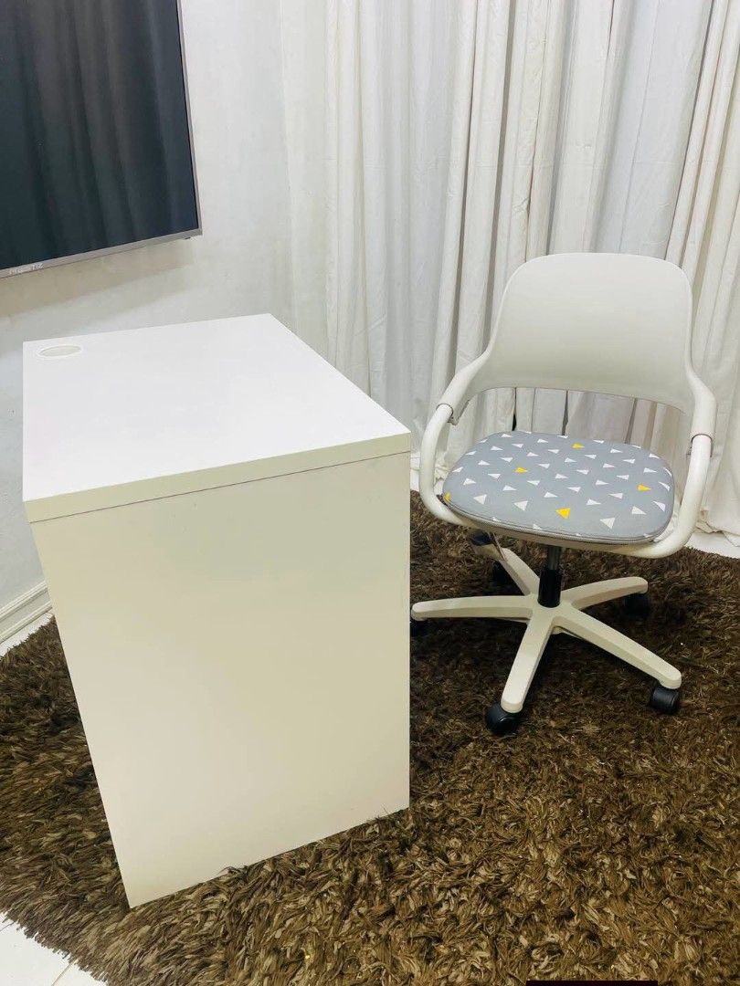 Desk Chair (Category: Chairs) located in Meycauayan. Submitted by marygracecasimiro (Listing ID 1463898237, Image 3). Description: Ergonomic Hanssem desk chair featuring a grey cushioned seat and a removable - Zipper type cover. Adjustable armrest and Height. Table is Ikea Get this set for 5.5k🩷🧡.