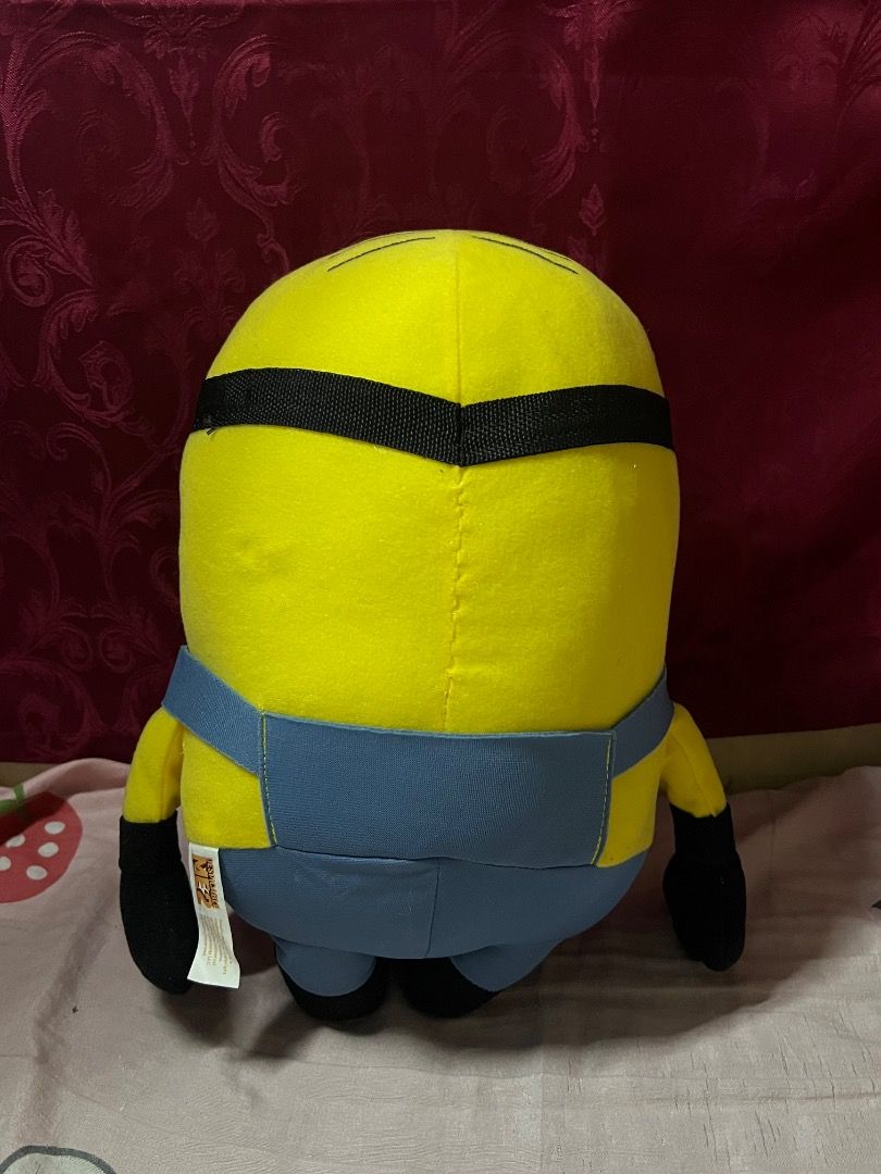 Despicable Me Minion Plush Toy (Category: Plushies & Soft Toys) located in Bulacan. Submitted by haven_plushie_dolls.888 (Listing ID 1463834772, Image 2). Description: - Adorable yellow Minion plush toy - Inspired by Despicable Me - Features iconic blue overalls and single eye - Super soft and cuddly material - Perfect gift for movie fans.