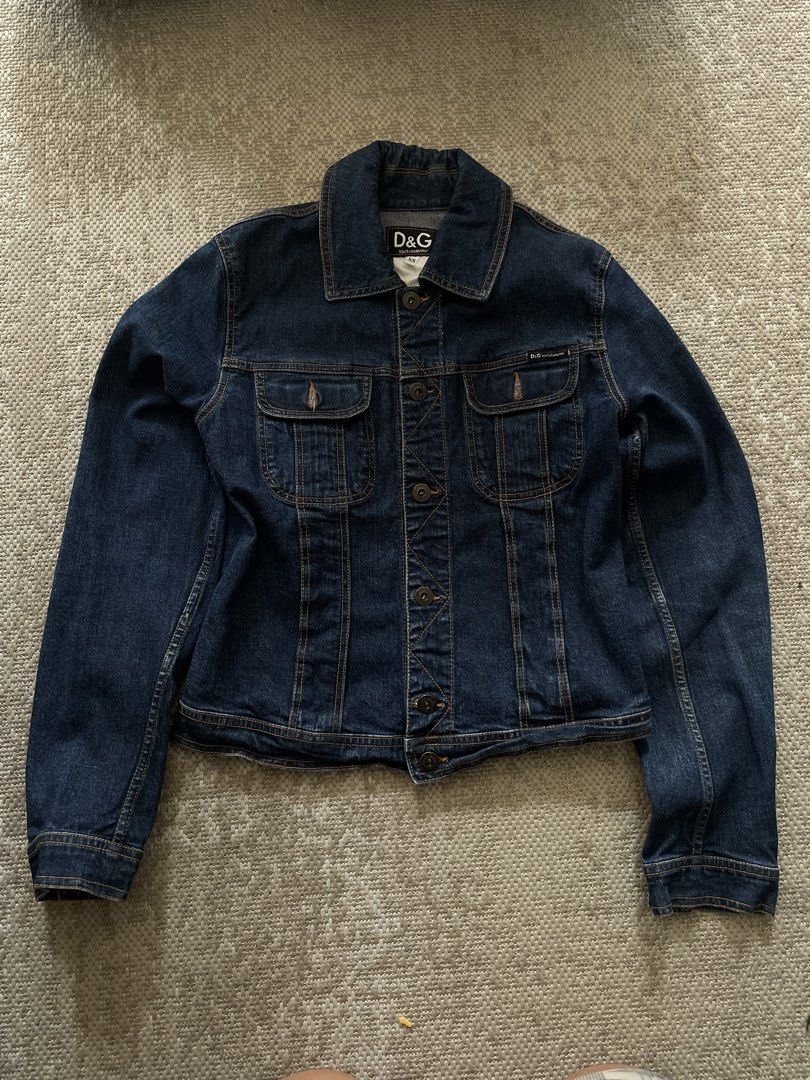 D&G Dolce & Gabbana Denim Jacket XS (Category: Coats, Jackets and Outerwear) located in Manila. Submitted by rei.ocn (Listing ID 1463846066, Image 2). Description: - Classic dark wash denim jacket from D&G - Features button closure - Two chest pockets with D&G logo detail - Versatile staple piece - Size XS.