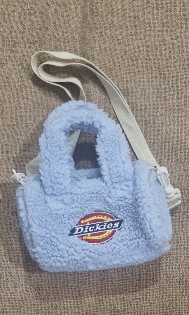 Dickies bag (Category: Cross-body Bags) located in San Jose del Monte. Submitted by angelsnest (Listing ID 1463827320, Image 1). Description: Sherpa fleece Sign of usage but no flaw pretty sports bag 8"W x 6"L rfs: decluttering Gcash, Maya, Bank transfer No COD available.