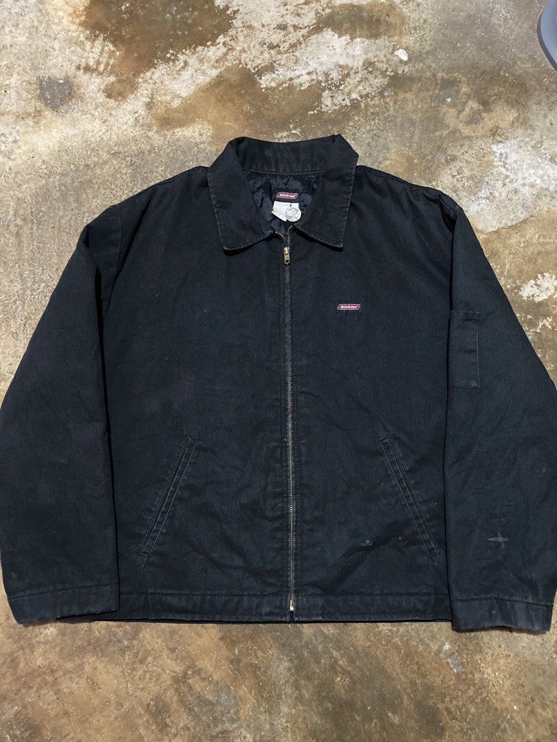 Dickies Black Work Jacket (Category: Coats, Jackets and Outerwear) located in Pasay City. Submitted by ken_98 (Listing ID 1463789149, Image 1). Description: W27xL26.5 - Classic black Dickies work jacket - Signature red Dickies logo patch on chest - Zipper closure - Two front pockets - Visible wear and tear on cuffs - Small hole on the front (see pictures) - Still a solid and durable jacket.