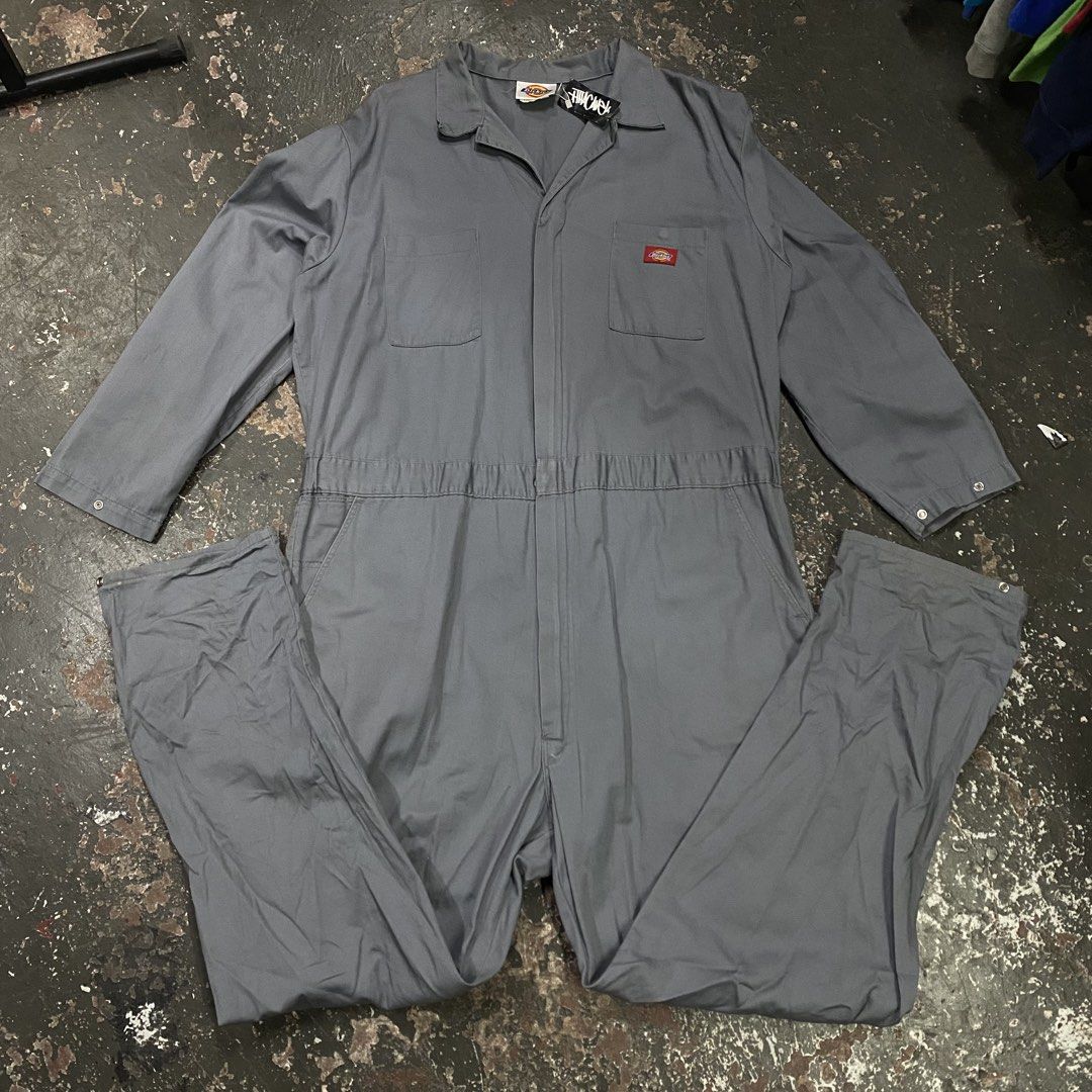 Dickies Grey Work Jumpsuit Coveralls (Category: Jumpsuits) located in Cagayan de Oro. Submitted by sumamestreethub (Listing ID 1463859728, Image 1). Description: - Grey Dickies work jumpsuit - Long sleeves with snap cuffs - Elasticated waist for comfort - Multiple front and back pockets - Classic Dickies logo patch on chest - Versatile for work or casual wear.