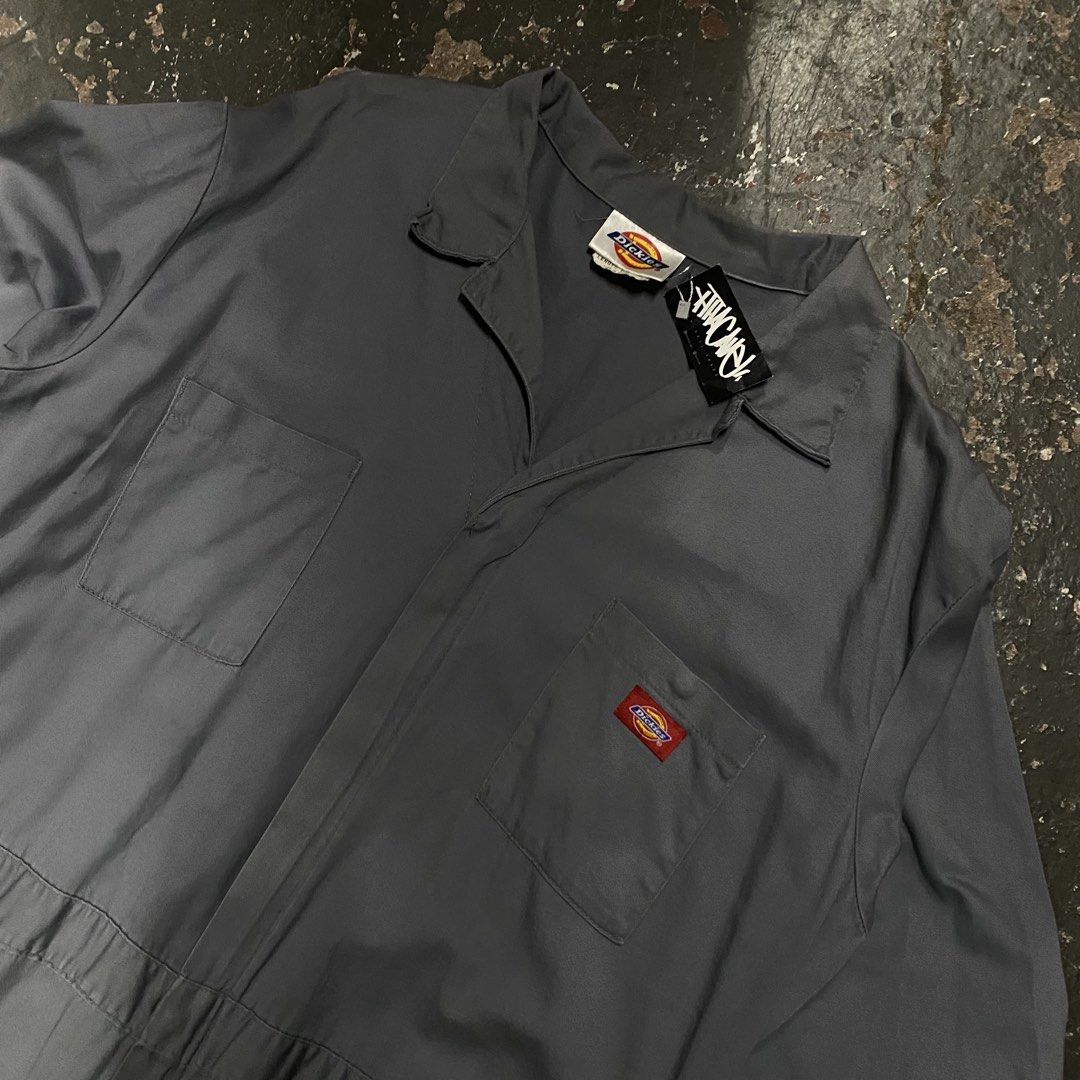Dickies Grey Work Jumpsuit Coveralls (Category: Jumpsuits) located in Cagayan de Oro. Submitted by sumamestreethub (Listing ID 1463859728, Image 2). Description: - Grey Dickies work jumpsuit - Long sleeves with snap cuffs - Elasticated waist for comfort - Multiple front and back pockets - Classic Dickies logo patch on chest - Versatile for work or casual wear.