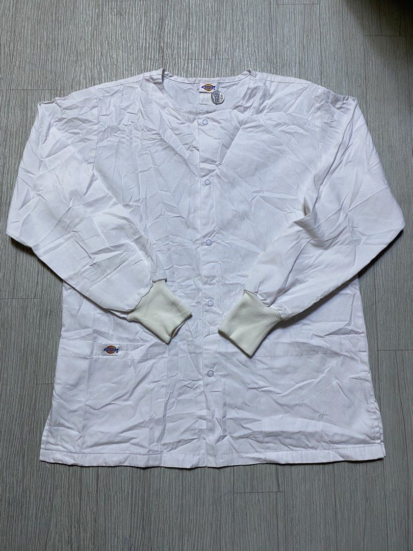 Dickies White Snap Button Scrub Jacket (Category: Coats, Jackets and Outerwear) located in Pasig City. Submitted by terrencec34805 (Listing ID 1463913114, Image 1). Description: White Dickies scrub jacket Long sleeves with elastic cuffs Snap button front closure Two lower front pockets Perfect for medical purposes Excellent condition Size:Medium Width:20.5 Length:27 .