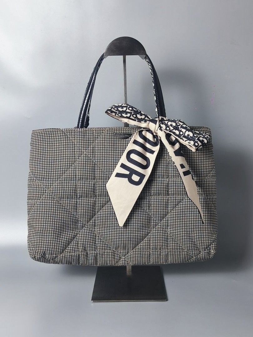 Dior Houndstooth Handbag (Category: Luxury Bags & Wallets) located in Bulacan. Submitted by 4kcollection (Listing ID 1463749438, Image 1). Description: Dior Houndstooth Handbag Pre-loved from Japan Very Good Condition Size: Medium Ykk Zip Sign of Use Need wash No rubs No cracks Dm for sure buyer 📩 MOP: Gcash / Maya / BPI Courier: J&t / Lbc / Lalamove Location: SJDM Bulacan.
