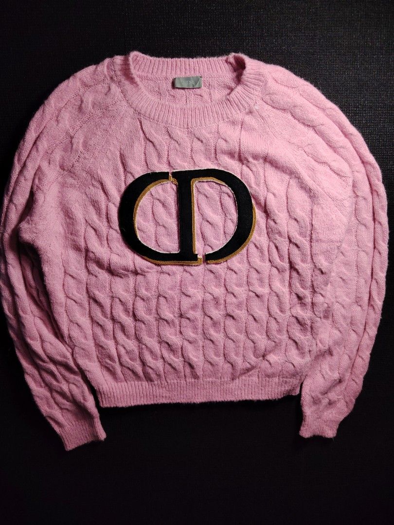 Dior Pink Cable Knit CD Logo Sweater (Category: Longsleeves) located in Baguio. Submitted by angeloshoppebaguio2600 (Listing ID 1463833606, Image 1). Description: - Dior pink cable knit sweater - Iconic CD logo on the front - Made in Italy - Material: 100% Cotton with embroidery details - A must-have piece for your wardrobe 💠DIOR KNITTED Length : 23.9 inches Width (Underarm) : 22 inches.