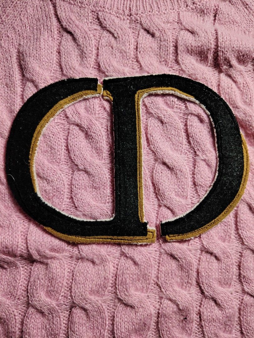 Dior Pink Cable Knit CD Logo Sweater (Category: Longsleeves) located in Baguio. Submitted by angeloshoppebaguio2600 (Listing ID 1463833606, Image 2). Description: - Dior pink cable knit sweater - Iconic CD logo on the front - Made in Italy - Material: 100% Cotton with embroidery details - A must-have piece for your wardrobe 💠DIOR KNITTED Length : 23.9 inches Width (Underarm) : 22 inches.