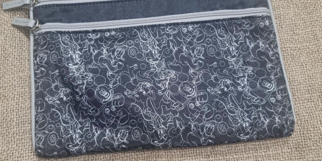 Disney pouch (Category: Purses & Pouches) located in San Jose del Monte. Submitted by angelsnest (Listing ID 1463828711, Image 3). Description: With signs of usage Needs wash 10"W x 8"L rfs: decluterring Gcash, Maya, Bank transfer No COD available.