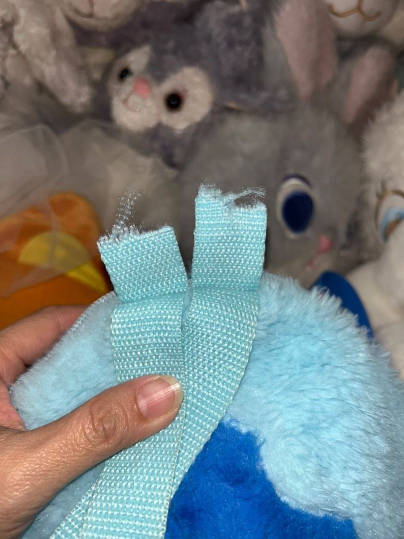 Disney Stitch Plush Backpack with free Keychain (Category: Plushies & Soft Toys) located in Las Pinas. Submitted by whatzupriley (Listing ID 1463861633, Image 2). Description: 💙 Stitch Plush Backpack Cute and cuddly Stitch plush backpack 💙 Perfect for kids, Stitch fans, or collectors! 📌 CONDITION / ISSUE: ⚠️ The top carrying strap has been cut/damaged — please see photos. The strap will need to be repaired or reattached if you want to use it a