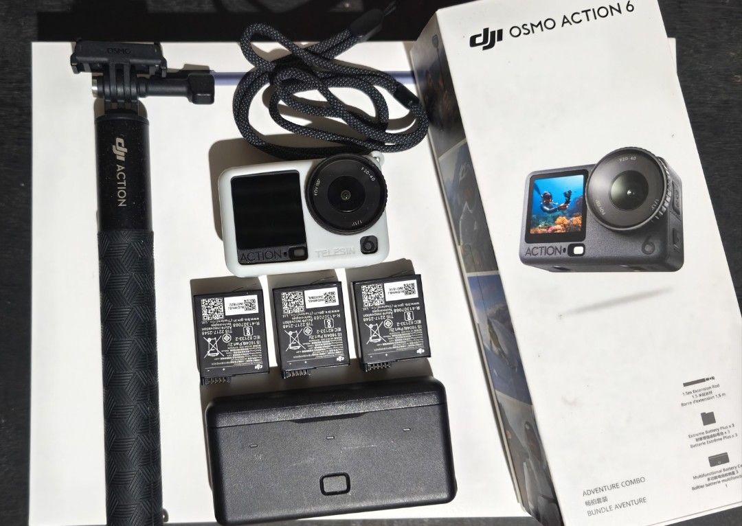 DJI Osmo Action 6 Adventure Combo with Accessories (Category: Video Cameras) located in Bulacan. Submitted by archmaurice (Listing ID 1463822545, Image 1). Description: - DJI Osmo Action 6 Camera - Original Box Included - Accessories: Selfie Stick, Charging Case - 3 Extra Batteries HONEST ISSUE: COSMETIC ONLY (DENT AND SCRATCH ON OUTER PROTECTIVE LENS (SIDE ONLY) FROM A RECENT DROP DURING A MOUTAIN HIKE. COSMETIC RELATED ISSUE BUT WORKS PERFECTLY