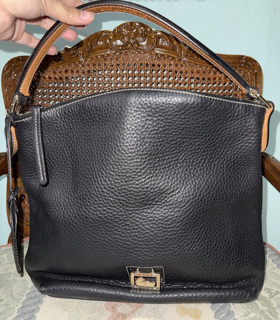 Dooney & Bourke shoulder bag (full grained leather) (Category: Shoulder Bags) located in Makati City. Submitted by prebykris (Listing ID 1463884097, Image 3). Description: Guaranteed authentic from the US Retails for $1,300; selling low but slightly negotiable for serious buyers Comes with authenticity card and leather tag.