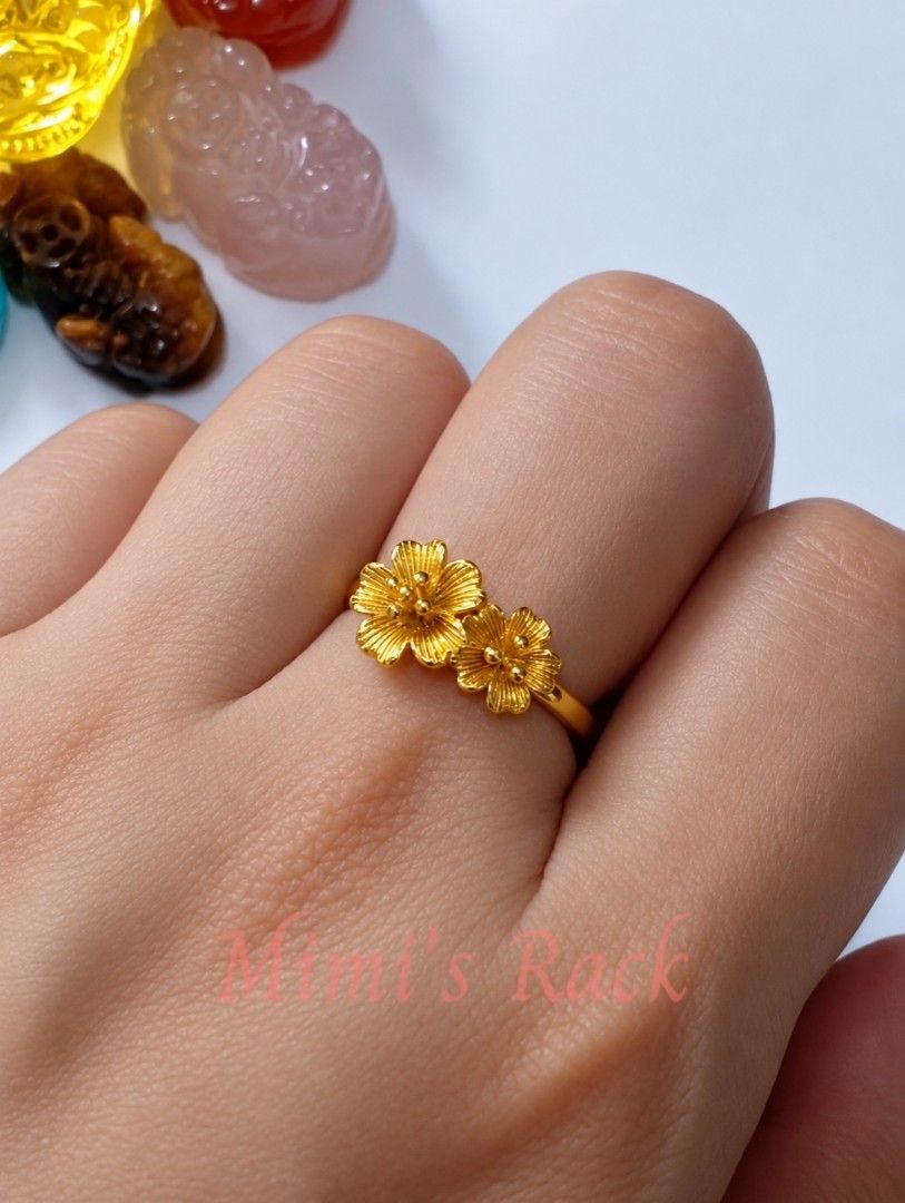 Double Sakura Flower Adjustable Ring | Gold Tone Floral Ring (Category: Rings) located in Taguig. Submitted by mimisrack (Listing ID 1463810273, Image 3). Description: 💛A delicate double sakura ring that adds a touch of elegance and femininity to any outfit. -Features two detailed sakura (cherry blossom) flowers -Adjustable open-band design fits most finger sizes -In Japanese culture, sakura blossoms symbolize beauty, renewal, hope, and the flee