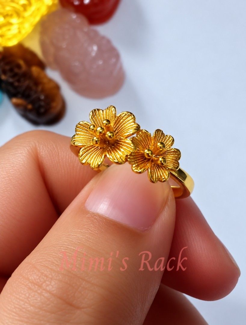 Double Sakura Flower Adjustable Ring | Gold Tone Floral Ring (Category: Rings) located in Taguig. Submitted by mimisrack (Listing ID 1463810273, Image 2). Description: 💛A delicate double sakura ring that adds a touch of elegance and femininity to any outfit. -Features two detailed sakura (cherry blossom) flowers -Adjustable open-band design fits most finger sizes -In Japanese culture, sakura blossoms symbolize beauty, renewal, hope, and the flee