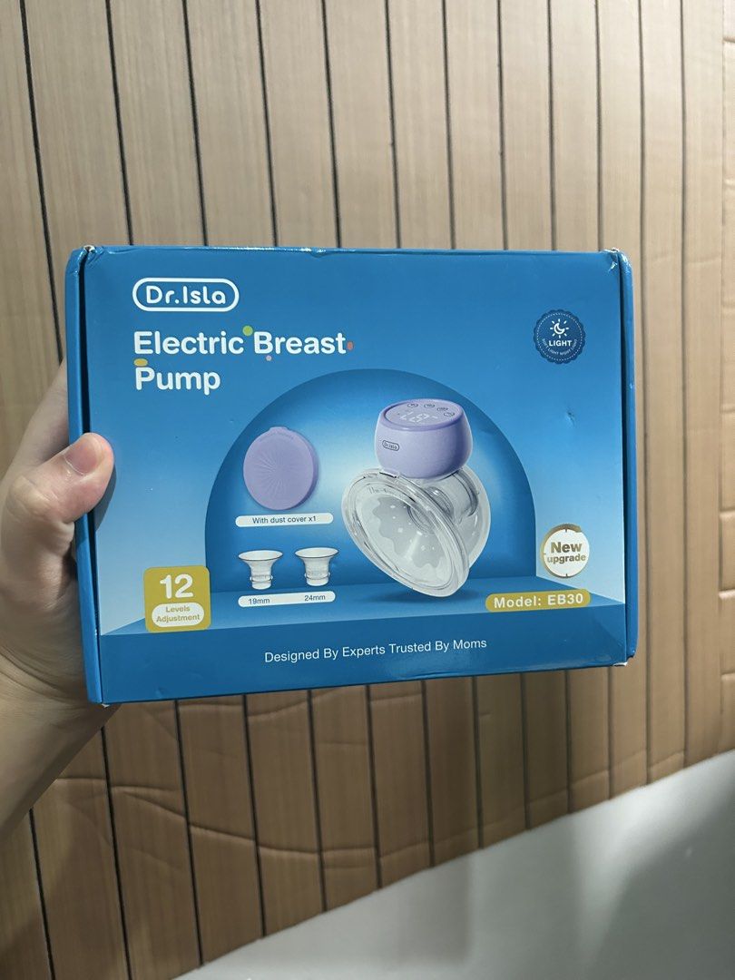 Dr. Isla Electric Breast Pump Model EB30 (Category: Breastfeeding & Bottle Feeding) located in Quezon City. Submitted by swimsuitout (Listing ID 1463781573, Image 1). Description: - Dr. Isla Electric Breast Pump (Model EB30) - 12 Adjustable Suction Levels - Includes Dust Cover - Comes with 19mm and 24mm Flange Sizes - Lightweight and Portable Design - Expertly Designed and Mom-Trusted - Includes a Convenient Storage Bag.