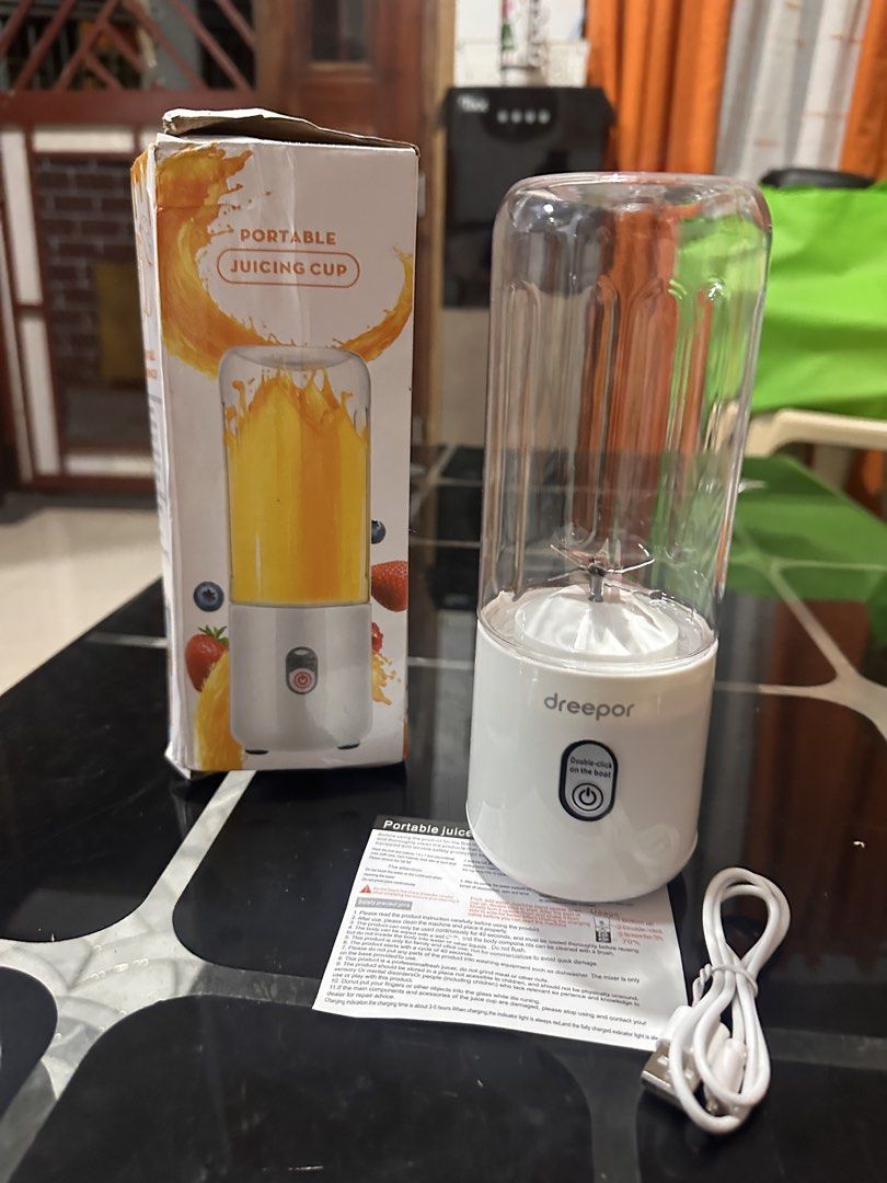 Dreepor Portable Juicing Cup USB Rechargeable Blender (Category: Juicers, Blenders & Grinders) located in Manila. Submitted by zuripot0726 (Listing ID 1463843733, Image 2). Description: - Portable 500ml juicing cup - USB rechargeable for on-the-go power - Ideal for making smoothies and fresh juices - Simple to operate and clean - Includes charging cable - Perfect for travel, office, or gym ✅ never been used.