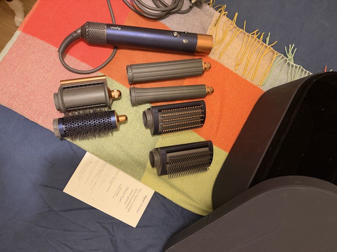 Dyson Airwrap Complete Long (Category: Hair) located in Pasig City. Submitted by ina410 (Listing ID 1463889115, Image 2). Description: complete set in Prussian Blue / Rich Copper. Bought for 25k last Dec 2025 from Dyson LazMall no issue other than storage case lid having scratches RFS: Prefer other styling tools.