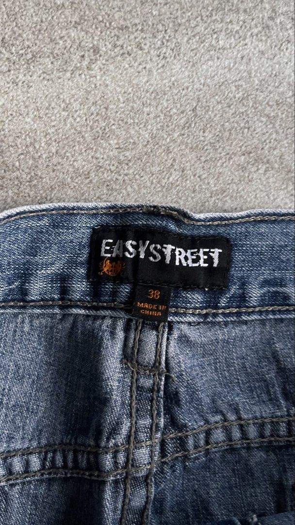 Easy Street Denim Shorts Size 38 (Category: Shorts) located in Cabuyao City. Submitted by bulandos (Listing ID 1463867814, Image 3). Description: - Easy Street dark wash denim shorts - Size 38 - Classic five-pocket style - Button and zip fly - Slightly faded denim - Minor marks on front leg (visible in last photo) - Perfect for casual outings.