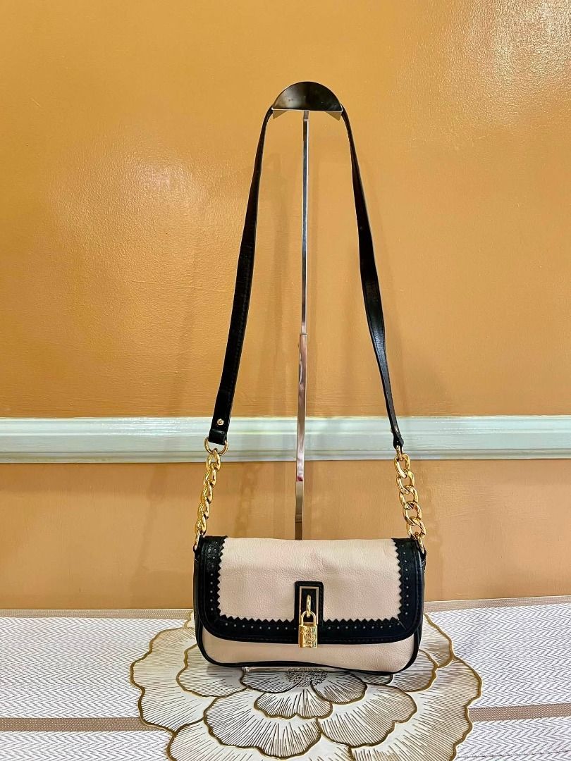 EMMA FOX Brand Sling or Body Bag (Category: Shoulder Bags) located in Quezon City. Submitted by bellafashion08 (Listing ID 1463769009, Image 1). Description: Dimension: - Height = 5.5 in. - Length = 9 in. * From U.S * Nice in actual .