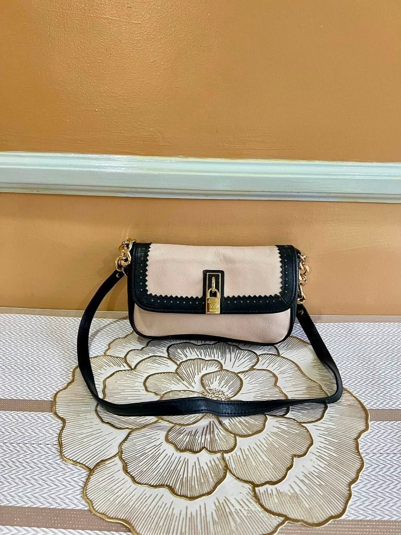 EMMA FOX Brand Sling or Body Bag (Category: Shoulder Bags) located in Quezon City. Submitted by bellafashion08 (Listing ID 1463769009, Image 3). Description: Dimension: - Height = 5.5 in. - Length = 9 in. * From U.S * Nice in actual .
