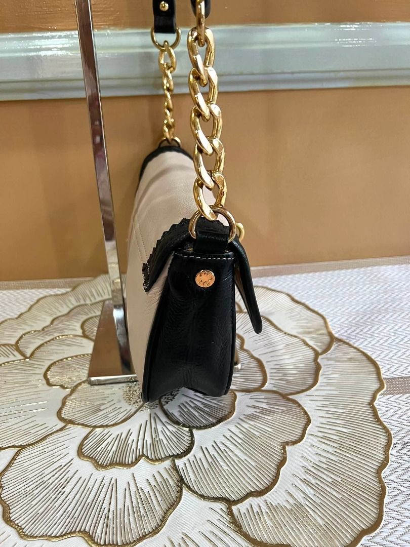 EMMA FOX Brand Sling or Body Bag (Category: Shoulder Bags) located in Quezon City. Submitted by bellafashion08 (Listing ID 1463769009, Image 2). Description: Dimension: - Height = 5.5 in. - Length = 9 in. * From U.S * Nice in actual .