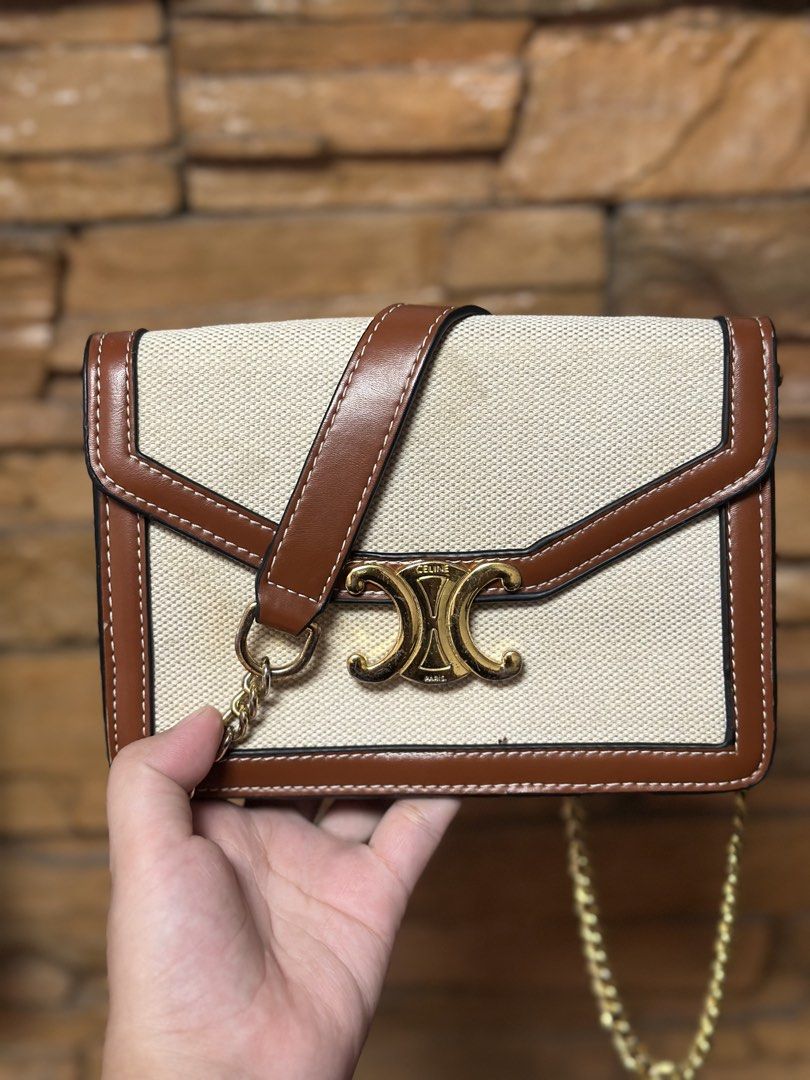 Envelope Bag on Chain (Category: Cross-body Bags) located in Batangas. Submitted by russonelli63 (Listing ID 1463772160, Image 1). Description: Sourced from a thrift store, so please self-authenticate based on the actual photos posted. Item is sold as-is. Has visible water stains and light smudges. Needs washing/spot cleaning to look its best. Not for picky buyers. All details, flaws, and actual photos are already posted, please check pictures ca