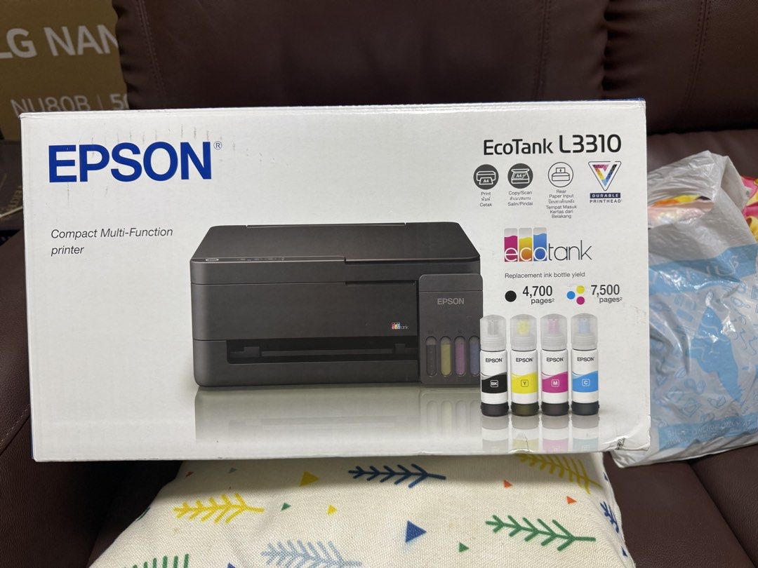 Epson EcoTank L3310 Compact Multi-Function Printer (Category: Printers, Scanners & Copiers) located in Singapore. Submitted by sspoh (Listing ID 1463871421, Image 1). Description: - Epson EcoTank L3310 Printer - Functions: Print, Copy, Scan - Ink System: EcoTank ink bottles - High Page Yield: 4,700 pages (black), 7,500 pages (color) - Design: Compact, with rear paper input - Suitable for: Home and office use.