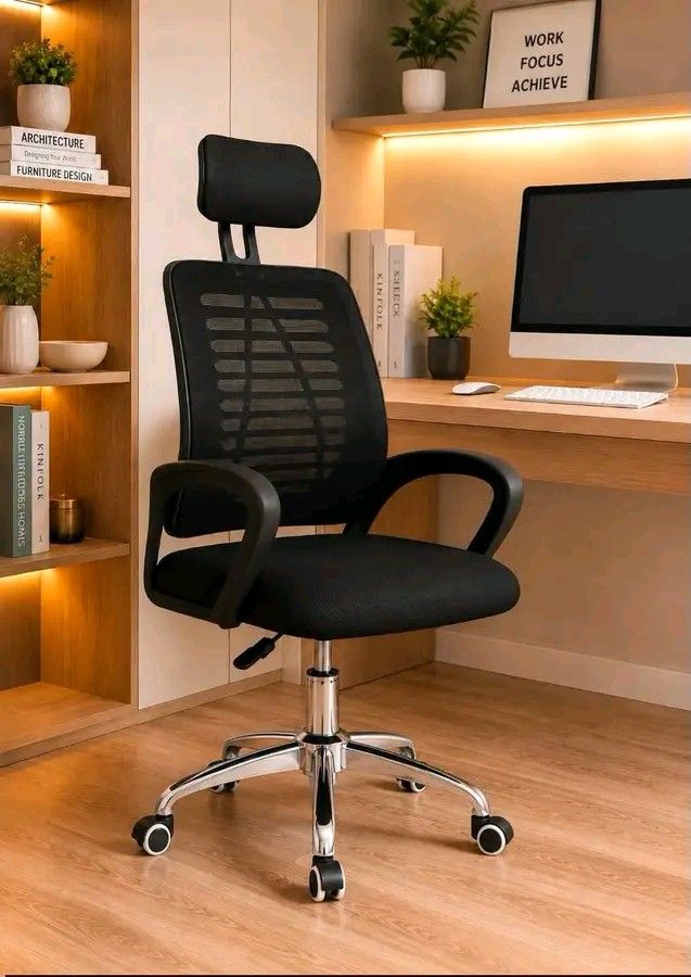 Ergonomic Mesh Office Chair with Headrest (Category: Office Furniture & Fixtures) located in Manila. Submitted by berdenmarl01688 (Listing ID 1463930081, Image 1). Description: - Ergonomic design for comfort and support - Breathable mesh back to keep you cool - Padded seat for extended sitting - Adjustable height for personalized fit - Integrated headrest for neck support - Sturdy chrome base with smooth-rolling wheels - Ideal for both home offic