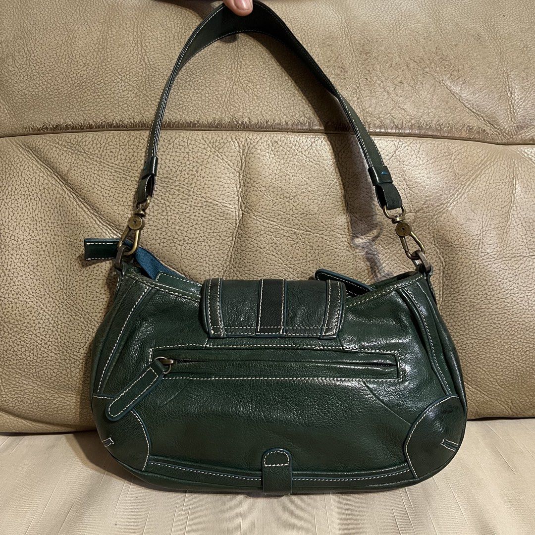 ESTINE Dark Green Leather Shoulder Bag (Category: Shoulder Bags) located in Calamba. Submitted by jupreloved_ (Listing ID 1463765415, Image 2). Description: Dark green ESTINE leather shoulder bag. Features front buckle flap, top zip, and back zip pocket. Interior zip and slip pockets. Brand: Estine Size: Small Shipping through J&T. Payment are strictly through GCASH only, no COD. Exact size and color may be different from the picture. This is a p