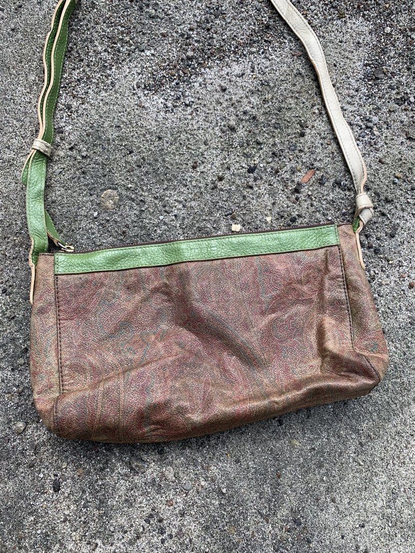 ETRO Paisley Shoulder Bag (Category: Shoulder Bags) located in Tacurong. Submitted by ljsthrift (Listing ID 1463742530, Image 2). Description: - Unique brown and green paisley print shoulder bag - Genuine leather trim and strap - Secure zipper closure - Compact size, ideal for carrying essentials - Shows some signs of wear, but plenty of life left - A stylish and eye-catching accessory.