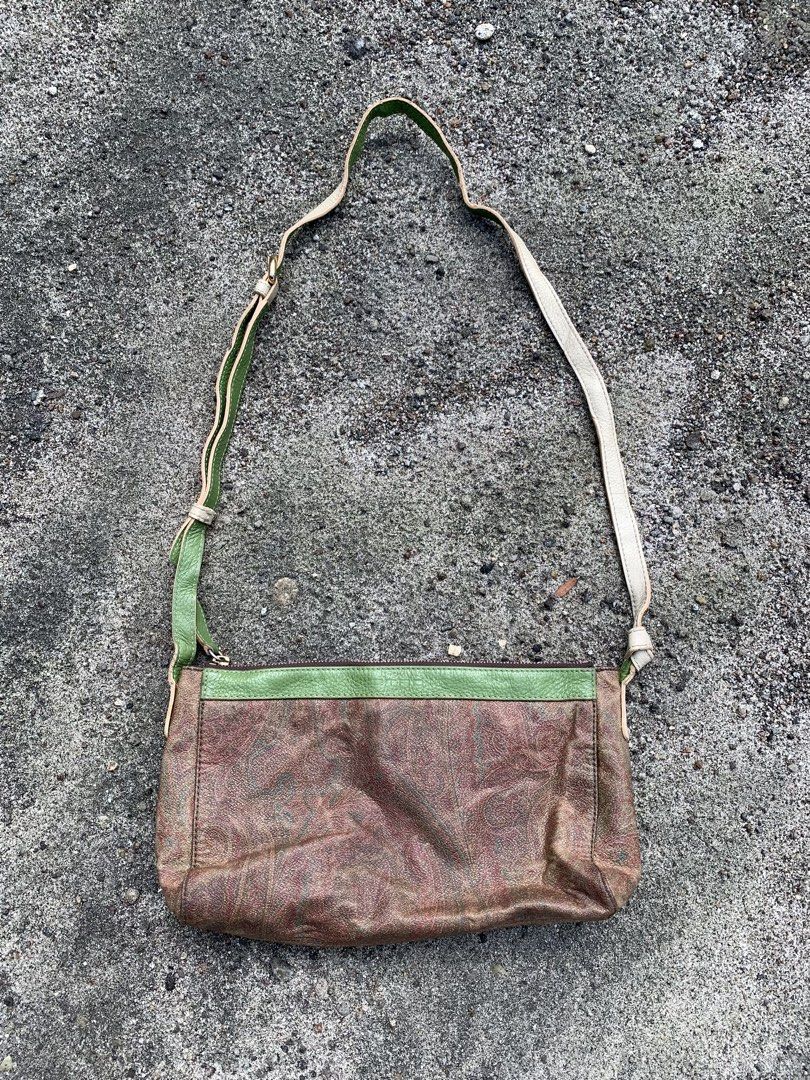 ETRO Paisley Shoulder Bag (Category: Shoulder Bags) located in Tacurong. Submitted by ljsthrift (Listing ID 1463742530, Image 1). Description: - Unique brown and green paisley print shoulder bag - Genuine leather trim and strap - Secure zipper closure - Compact size, ideal for carrying essentials - Shows some signs of wear, but plenty of life left - A stylish and eye-catching accessory.