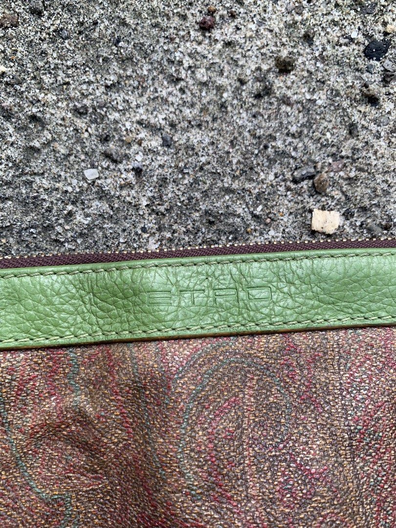 ETRO Paisley Shoulder Bag (Category: Shoulder Bags) located in Tacurong. Submitted by ljsthrift (Listing ID 1463742530, Image 3). Description: - Unique brown and green paisley print shoulder bag - Genuine leather trim and strap - Secure zipper closure - Compact size, ideal for carrying essentials - Shows some signs of wear, but plenty of life left - A stylish and eye-catching accessory.