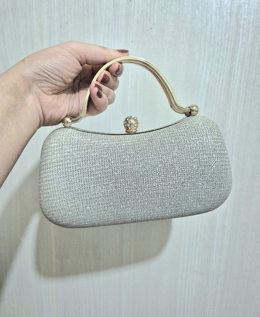 Evening Silver Clutch (Category: Clutches) located in San Mateo. Submitted by sellbypelle (Listing ID 1463855934, Image 2). Description: Pre loved 🌸 No Issue 📍 Location: Rizal 📦 + sf via J&T only ⏳ No rush shipping 💡 Actual color may vary slightly due to lighting and screen settings. .