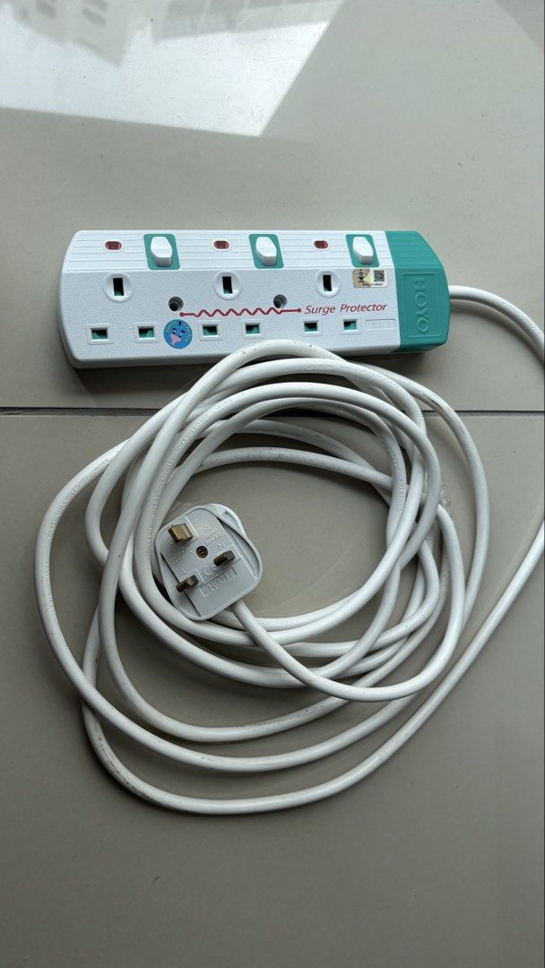 extension socket (Category: Electrical, Adaptors & Sockets) located in Cyberjaya. Submitted by cosmic.maram (Listing ID 1463836607, Image 3). Description: - Surge Protector Power Strip - 4 Sockets - Colour: White and Teal - Long White Cord - UK-Style Plug - Tested and Working.
