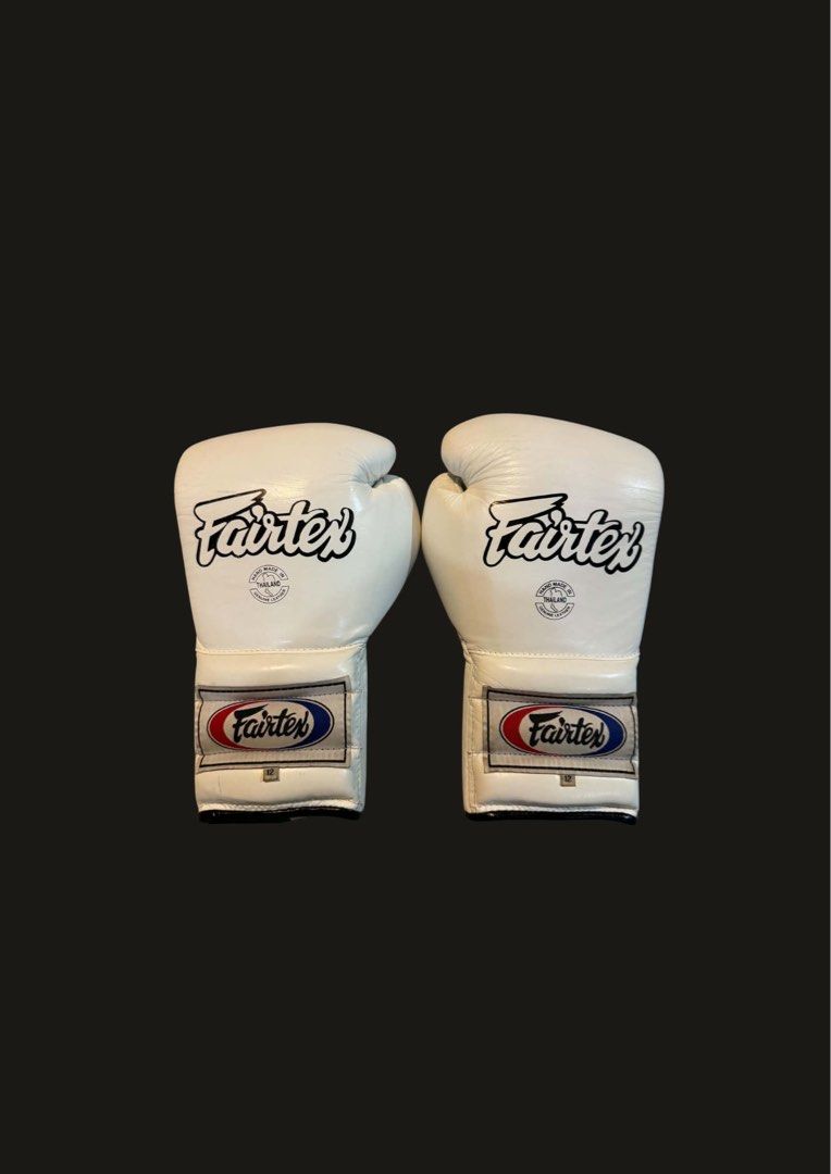 Fairtex White Leather Boxing Gloves with Laces (Category: Combat Sports) located in Binan City. Submitted by anton0428 (Listing ID 1463914374, Image 3). Description: Fairtex Lace Up Gloves For sale. 12 oz Great Condition No Foul Odor. 3500 php only (nego).