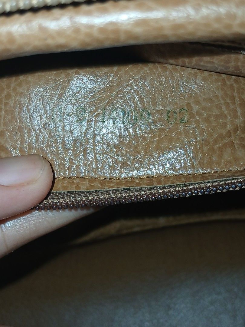 Fendi Zucca Monogram Canvas & Leather Handbag (Category: Luxury Bags & Wallets) located in Alaminos. Submitted by sachiKaSan (Listing ID 1463866277, Image 3). Description: - Authentic Fendi handbag - Iconic black Zucca logo on beige canvas - Black leather top handles and trim - Gold hardware details - Interior Fendi Made in Italy plaque - Timeless and classic design.