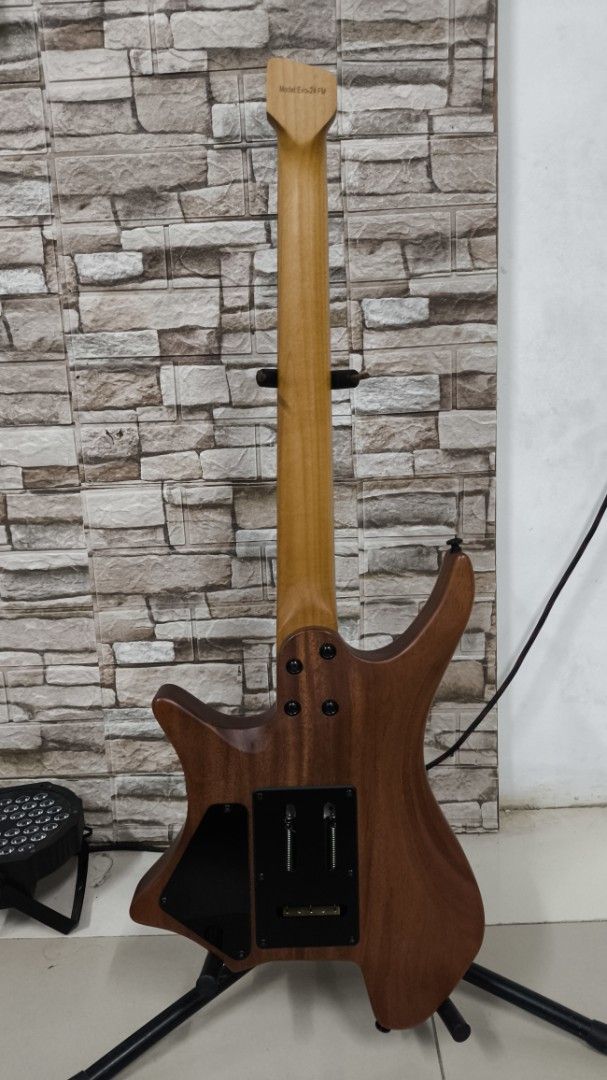 Fermata headless Electric Guitar Purple (Category: Musical Instruments) located in Taguig. Submitted by chesuteru (Listing ID 1463744082, Image 3). Description: - Fermata electric guitar - Unique purple finish - Flame maple top - Comes with a gig bag - Ideal for practice and performance - Ready for a new owner Inclusions: Gig bag Guitar cord cleaning tools strap.