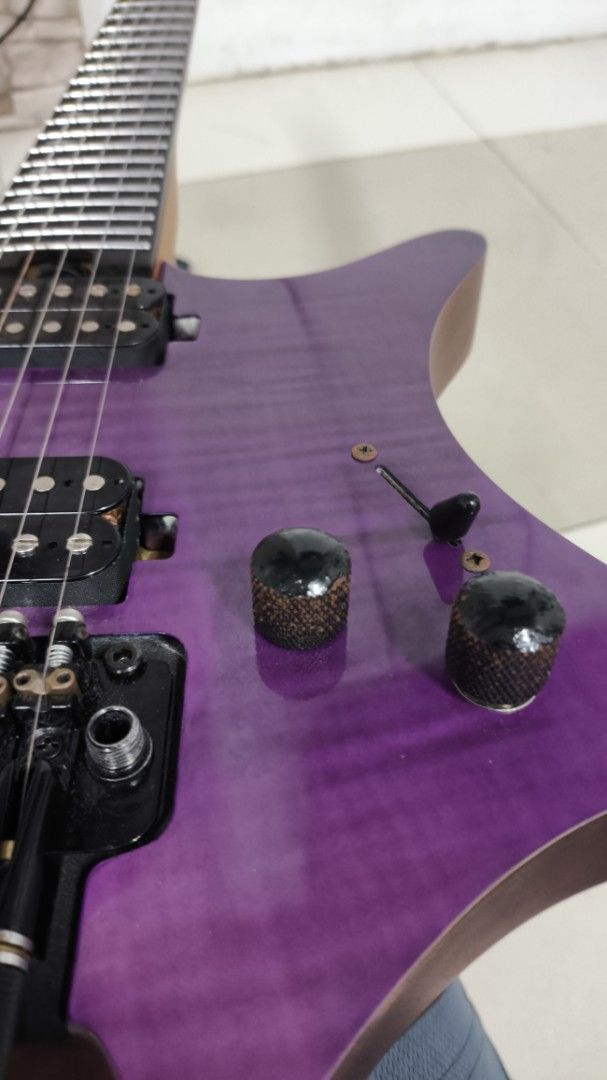 Fermata headless Electric Guitar Purple (Category: Musical Instruments) located in Taguig. Submitted by chesuteru (Listing ID 1463744082, Image 2). Description: - Fermata electric guitar - Unique purple finish - Flame maple top - Comes with a gig bag - Ideal for practice and performance - Ready for a new owner Inclusions: Gig bag Guitar cord cleaning tools strap.