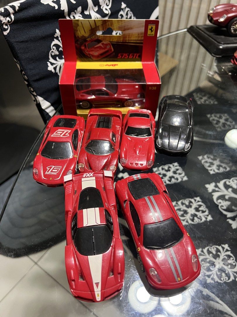 Ferrari 575 GTC Diecast Model Car Set (Category: Vehicle & Diecast Models) located in Manila. Submitted by cterrineni76861 (Listing ID 1463794612, Image 1). Description: - Set of Ferrari diecast model cars - Includes Ferrari 575 GTC model in original packaging - Other Ferrari models also available - Some cars are loose, one is still in its box - Ideal for collectors - Please check photos for specific details.