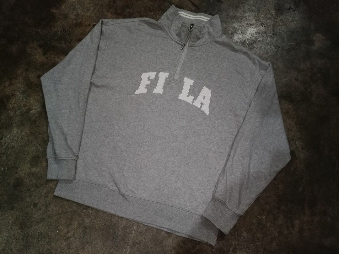 FILA , QUARTER ZIP (Category: Activewear) located in Davao. Submitted by dukekervy (Listing ID 1463896010, Image 1). Description: FILA QUARTER ZIP SIZE LARGE TO XL EXCELLENT CONDITION LOOSE FIT 24X28.