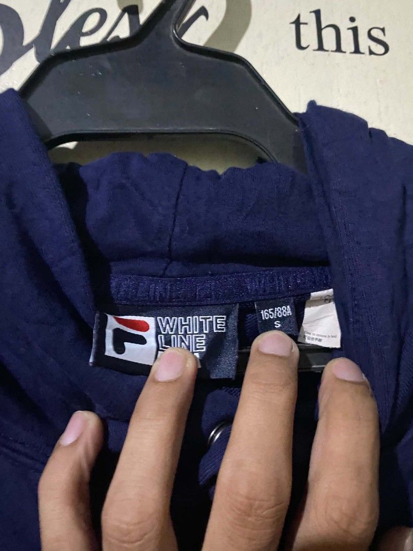 Fila "Originale" Navy Blue Hoodie (Category: Coats, Jackets and Outerwear) located in Caloocan City. Submitted by vincefresn21903 (Listing ID 1463759103, Image 2). Description: - Navy blue Fila hoodie - 'Originale' graphic detail - White piping along sleeves - Front kangaroo pocket - Size S (165/88A) - Made in China - Ideal for casual wear.