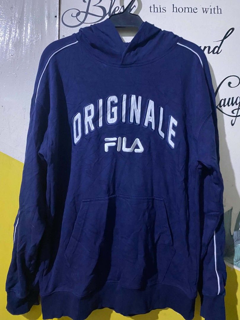 Fila "Originale" Navy Blue Hoodie (Category: Coats, Jackets and Outerwear) located in Caloocan City. Submitted by vincefresn21903 (Listing ID 1463759103, Image 1). Description: - Navy blue Fila hoodie - 'Originale' graphic detail - White piping along sleeves - Front kangaroo pocket - Size S (165/88A) - Made in China - Ideal for casual wear.