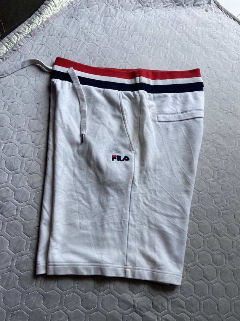 Fila Shorts (Category: Shorts) located in Panabo. Submitted by thrifty.red (Listing ID 1463858882, Image 1). Description: free waist length:21 hem:12.5 9.5/10 Excellent Washable stain.