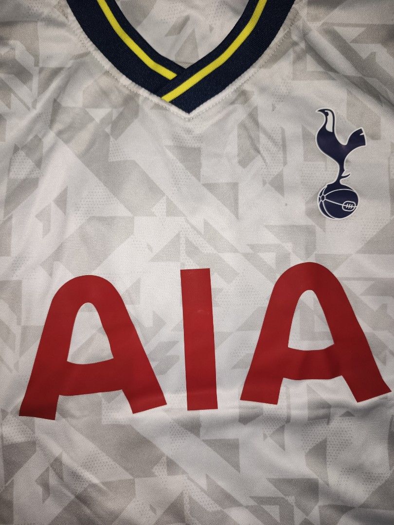FOOTBALL JERSEY (Category: Activewear) located in Davao. Submitted by jjj_mncd (Listing ID 1463875829, Image 3). Description: - Tottenham Hotspur 21/22 Season Jersey - Size: S - Sponsor: AIA (front) - Player Name/Number: Son 7 (back) - Brand: In-The-Zone - Color: White with navy and yellow accents - Ideal for any dedicated Spurs supporter!.