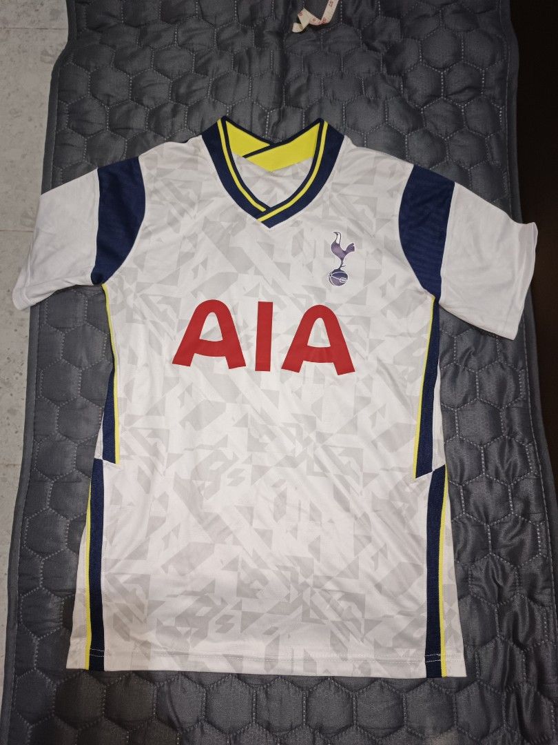 FOOTBALL JERSEY (Category: Activewear) located in Davao. Submitted by jjj_mncd (Listing ID 1463875829, Image 1). Description: - Tottenham Hotspur 21/22 Season Jersey - Size: S - Sponsor: AIA (front) - Player Name/Number: Son 7 (back) - Brand: In-The-Zone - Color: White with navy and yellow accents - Ideal for any dedicated Spurs supporter!.