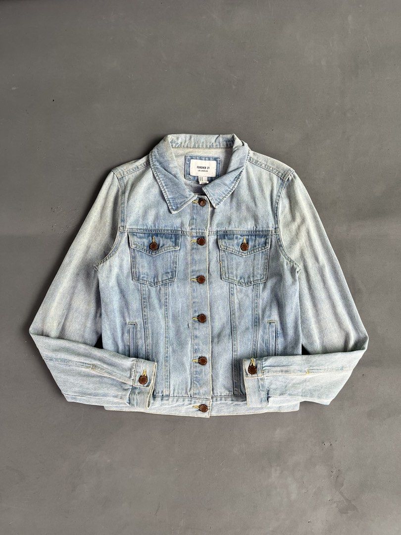 FOREVER 21 DENIM JACKET (Category: Coats, Jackets and Outerwear) located in Quezon City. Submitted by kentstuff (Listing ID 1463858816, Image 1). Description: F21 Size S On Tag Shoulder-Hem : 23.5” Pit-Pit : 19” Condition: Excellent CR: 9.8/10 Flaws: yellow stain Needwash DISCLAIMER: This is a thrifted item. All brands, logos, and trademarks belong to their rightful owners. We’re here to rehome great pieces — no brand affiliation intended..