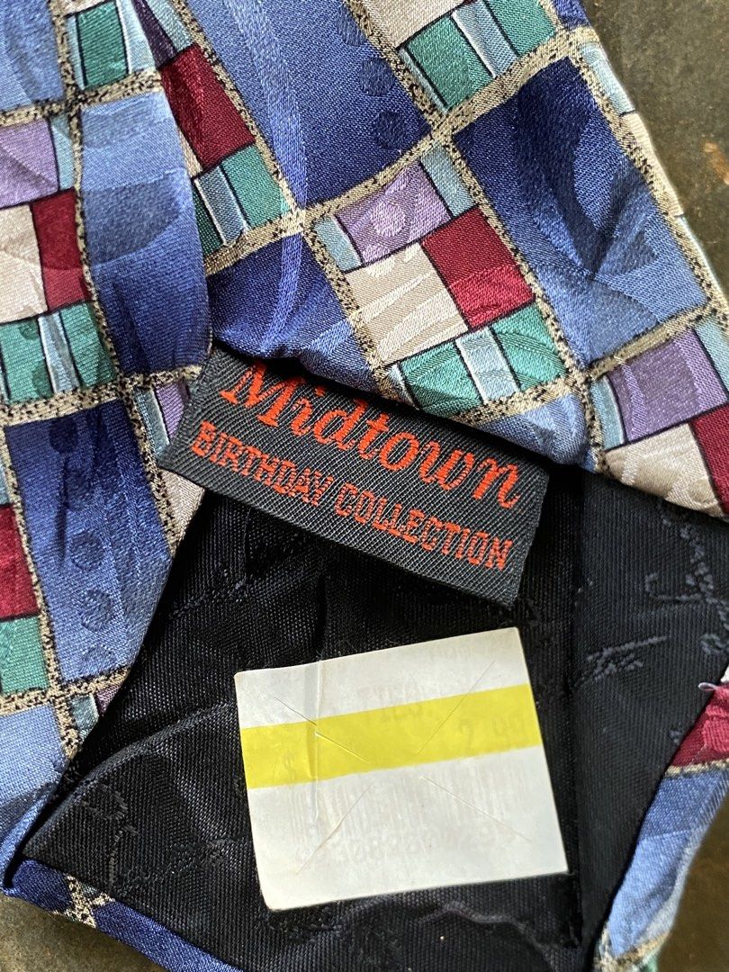Frank Sinatra Midtown Birthday Collection Tie (Category: Ties) located in Dapitan. Submitted by bolandojh07634 (Listing ID 1463911362, Image 2). Description: - Unique patterned tie featuring a Frank Sinatra label. - Part of the exclusive Midtown Birthday Collection. - Eye-catching pattern with blue, purple, red, and green squares. - Ideal for collectors or adding flair to a special occasion..
