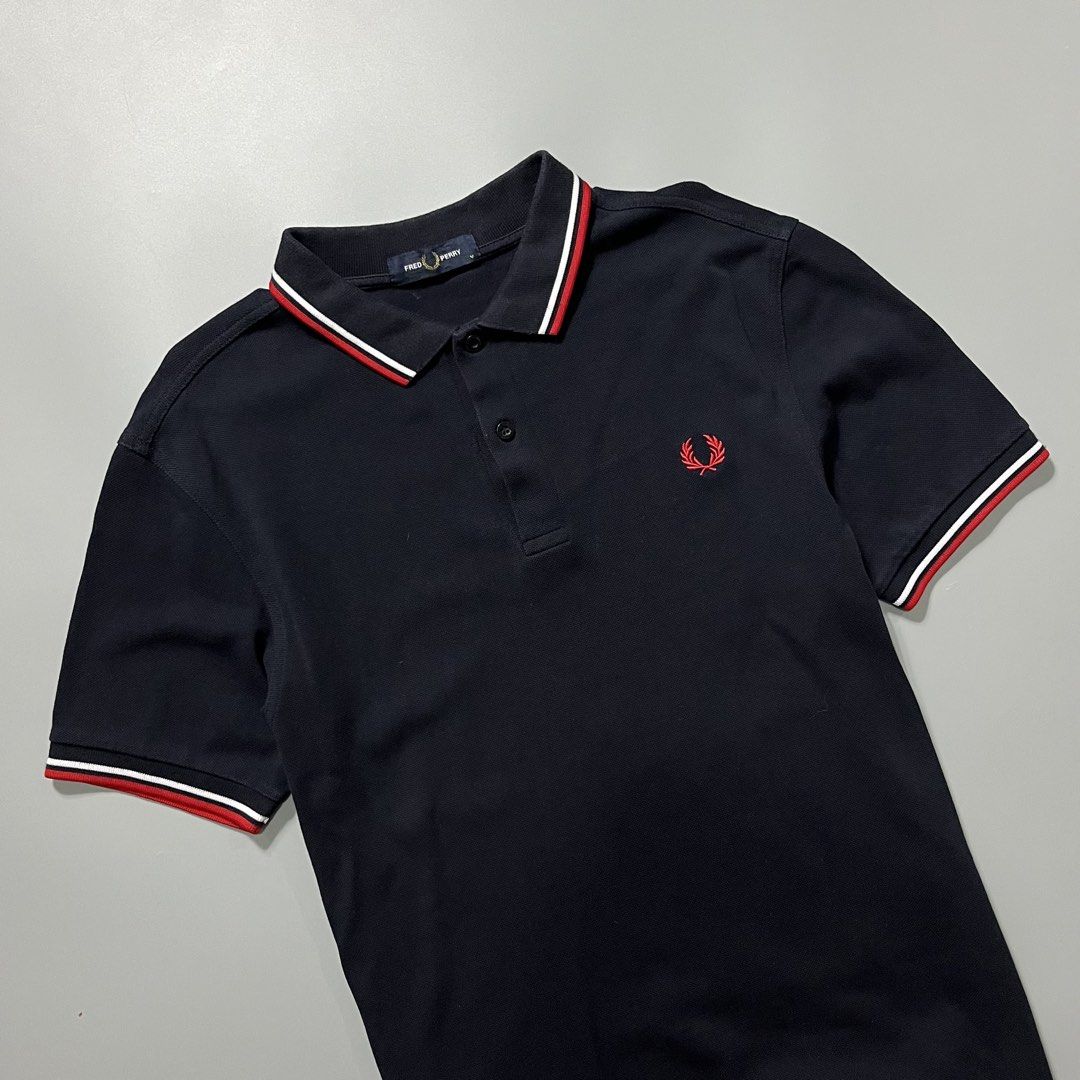 Fred Perry Polo shirt Navyblue (Category: Tshirts & Polo Shirts ) located in Angeles City. Submitted by jthrifted.clothes (Listing ID 1463871983, Image 2). Description: Fred Perry Polo shirt Navyblue Medium 19x27 Good condition Color rate 9.5/10 Issue slightly fade collar line.
